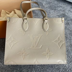 Louis Vuitton On The Go MM Turtle Dove